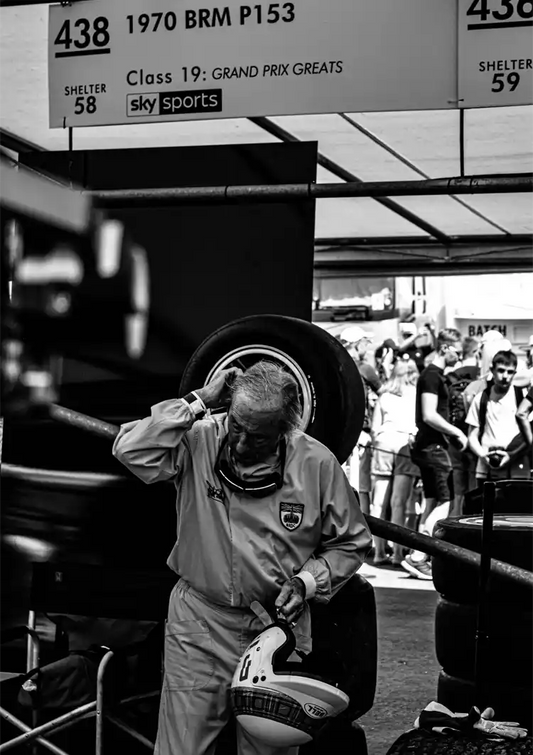Racer with helmet canvas painting in black and white in the paddock