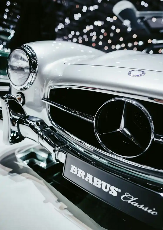 Klassieke auto canvas schilderij met chromen grille en stervormig embleem