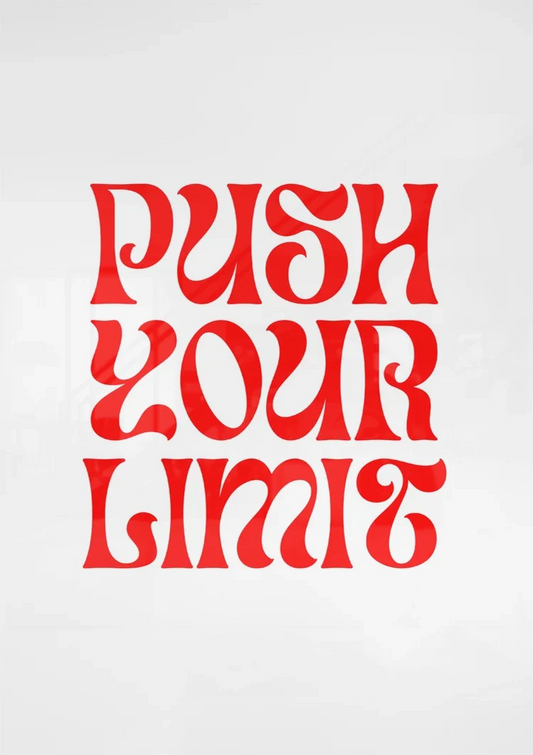 Push your limit text canvas painting on the wall above the sofa in the bedroom