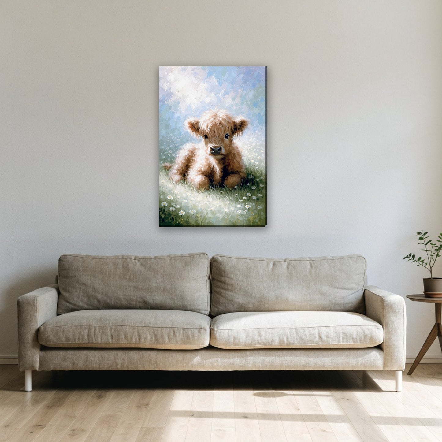 Hooglander kalfje canvas schilderij aan de muur boven de bank in de woonkamer