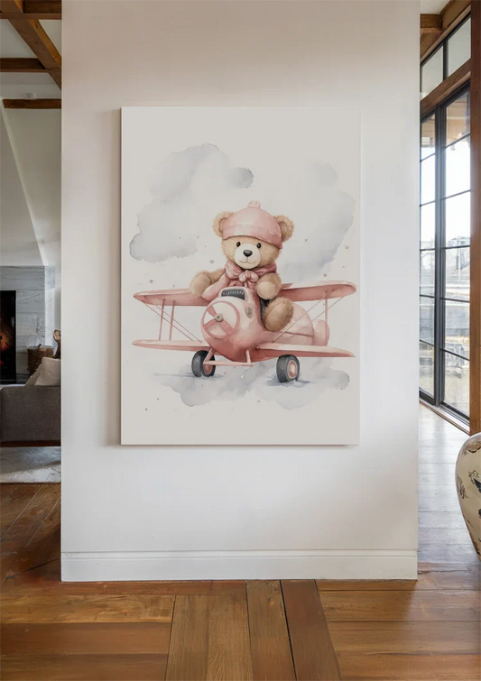 Teddybeer met vliegtuig canvas schilderij aan de muur bij de voordeur in de hal