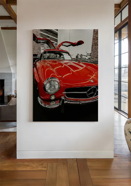 Red sports car canvas painting on the wall by the front door in the hallway