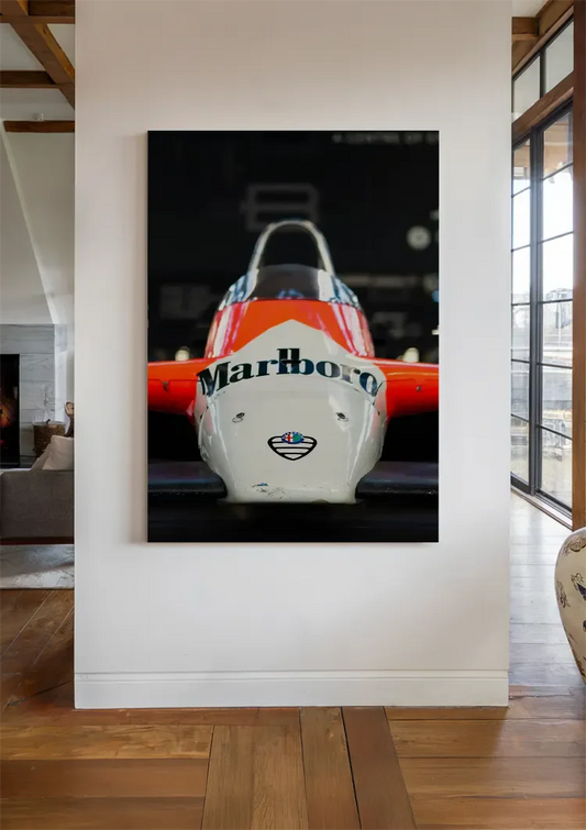 Classic racing car canvas painting on the wall by the front door in the hallway