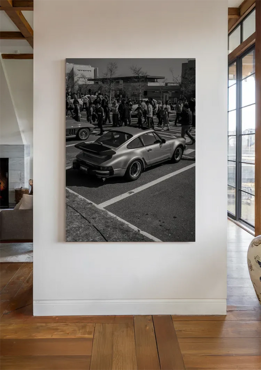 Silver sports car canvas painting by the front door in the hallway