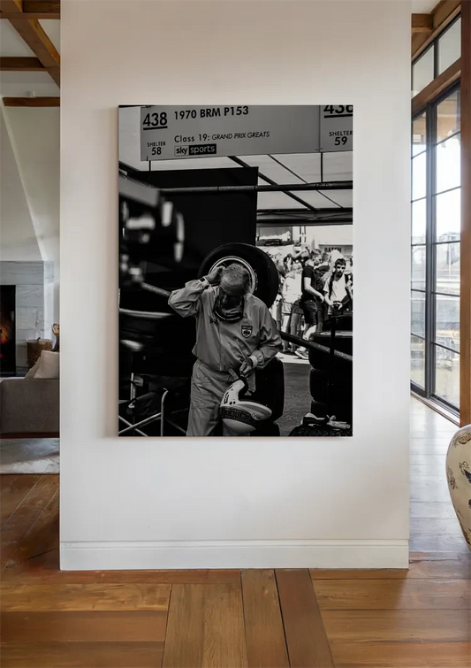 Racer with helmet canvas painting by the front door in the hallway