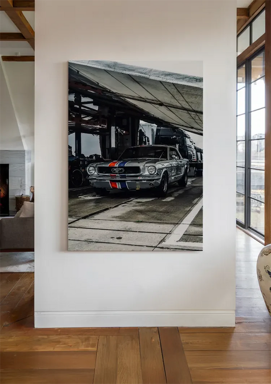 Silver sports car canvas painting on the wall in the hallway.