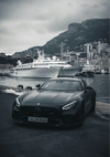 Schwarzer Mercedes AMG GTR Monaco Hafen Jachten Gemälde