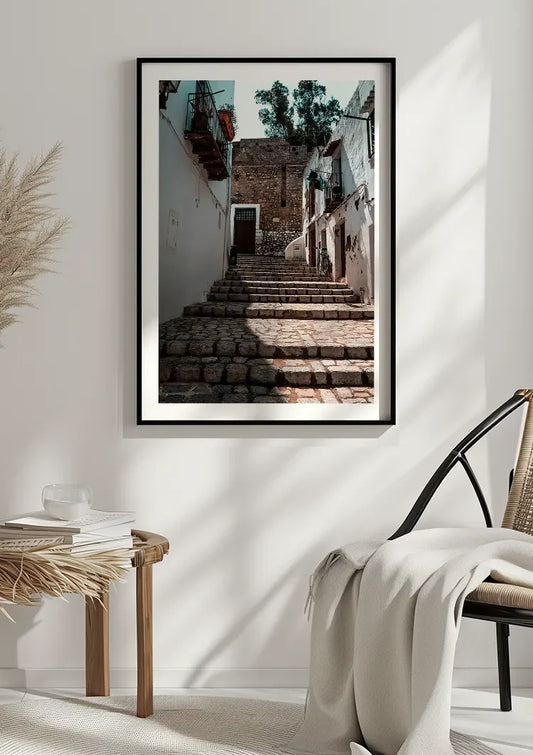 Keienstenen trap canvas schilderij aan de muur bij de kapstok in de hal