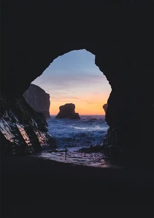 Rock Cave Overlooking Wild Ocean And Sunset Painting
