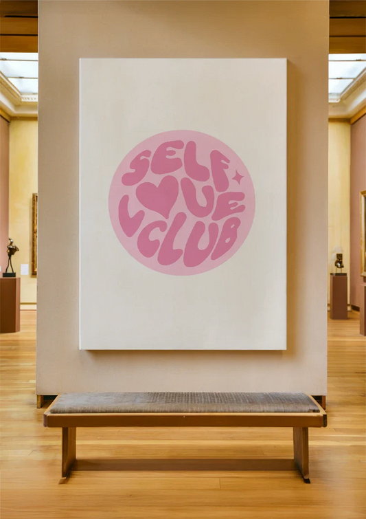 Self love club canvas painting on the wall in the hallway.
