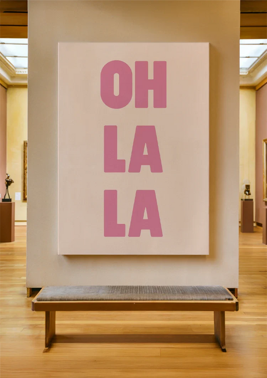 Oh la la text canvas painting on the wall above the sofa in the hallway
