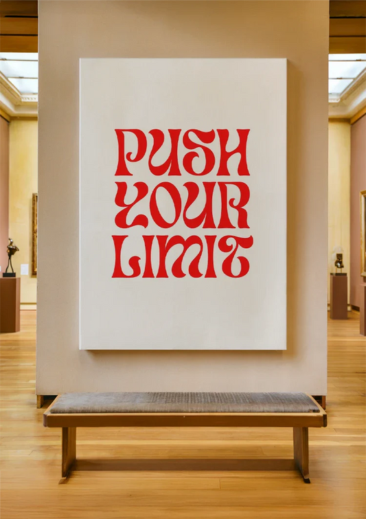 Push your limit text canvas painting on the wall above the sofa in the hallway