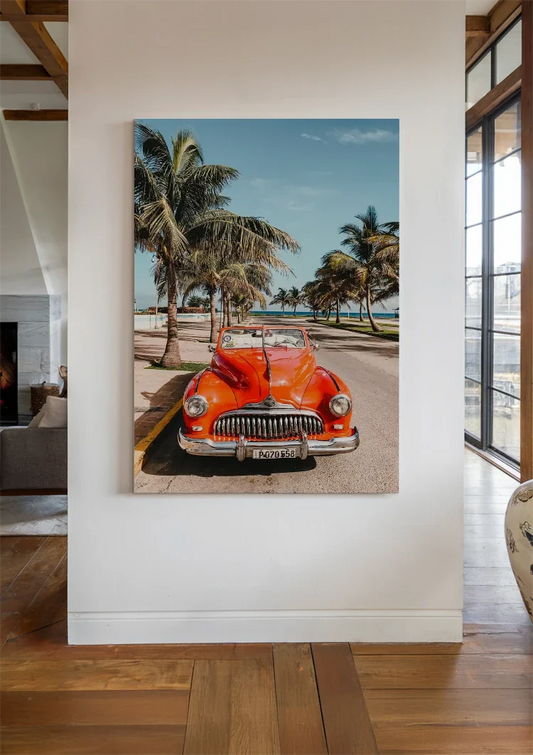 Rotes Auto bei den Palmen Leinwandbild an der Wand im Flur