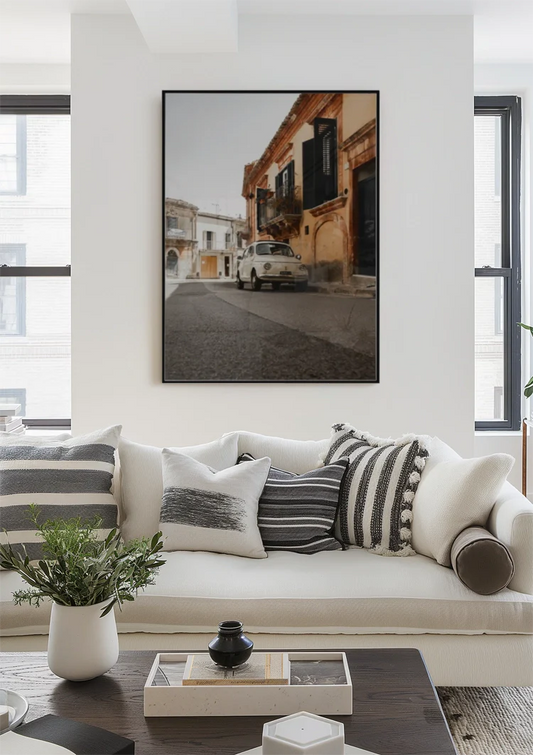 White vintage car canvas painting on the wall in the hallway