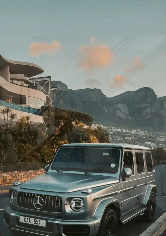 Silver off-road vehicle canvas painting on the wall above the bed in the bedroom