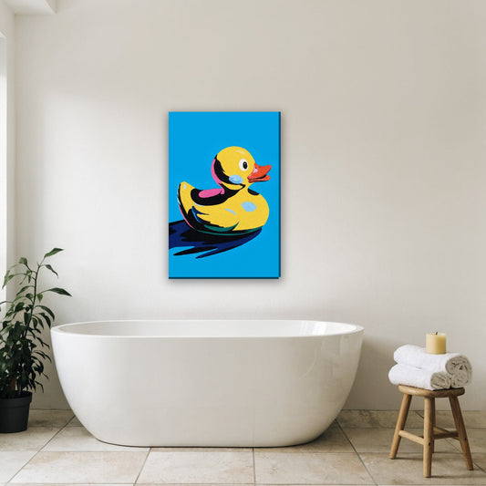 Badeend pop art canvas schilderij aan de muur in de badkamer boven het bad