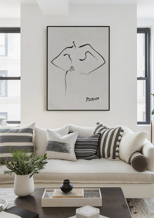Abstracte vrouw in lijnstijl canvas schilderij boven het bed in de slaapkamer.