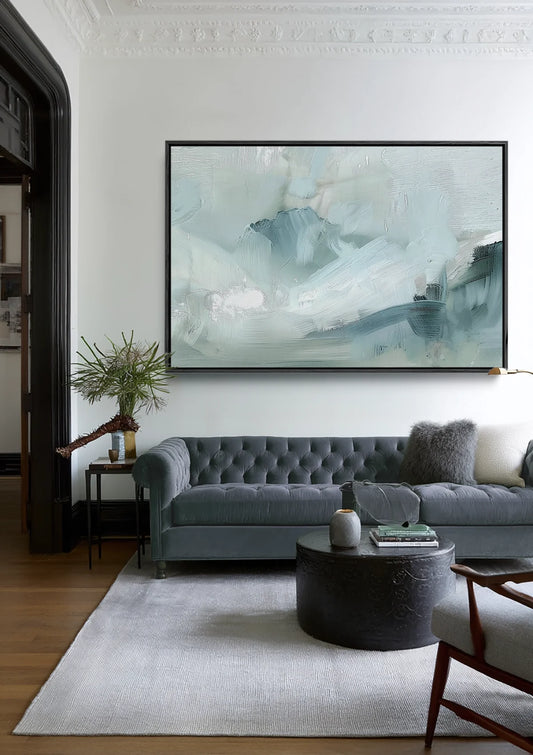 Abstract canvas schilderij aan de muur in de slaapkamer