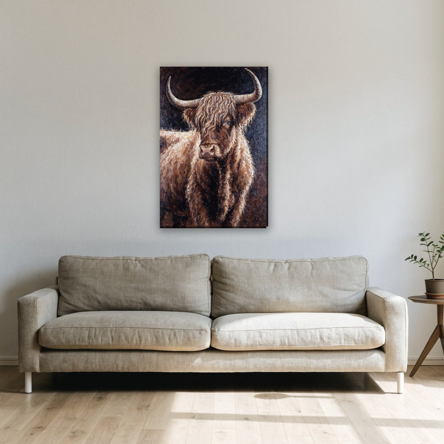 Hooglander portret in olieverf canvas schilderij aan de muur boven de bank in de woonkamer