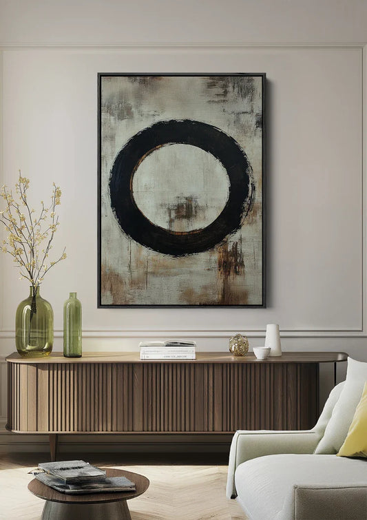 Zwarte cirkel canvas schilderij aan de muur boven het bed in de slaapkamer