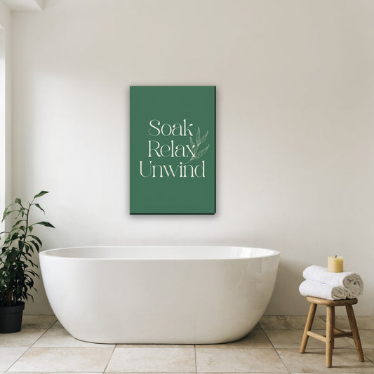 Soak Relax Unwind tekst canvas schilderij aan de muur in de badkamer boven het bad